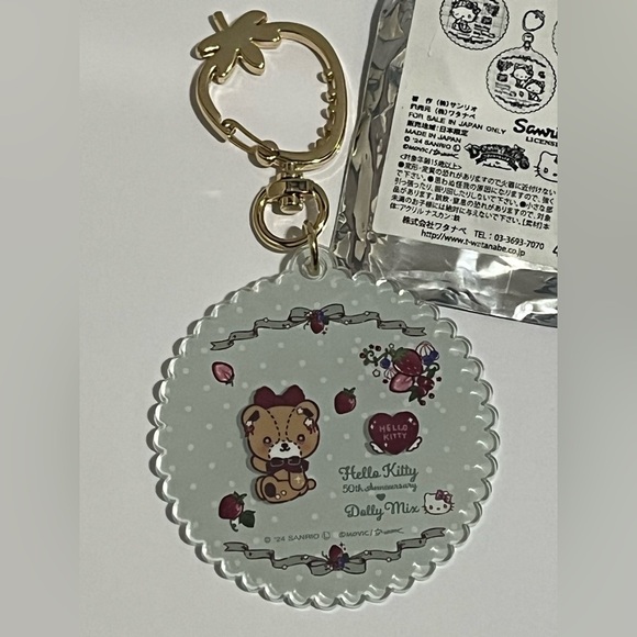 Hello Kitty 50th Anniversary Blind Bag Tiny Chum Acrylic Key Holder - Picture 2 of 6
